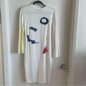 Cream Front Row Shop dress with geometric color accents